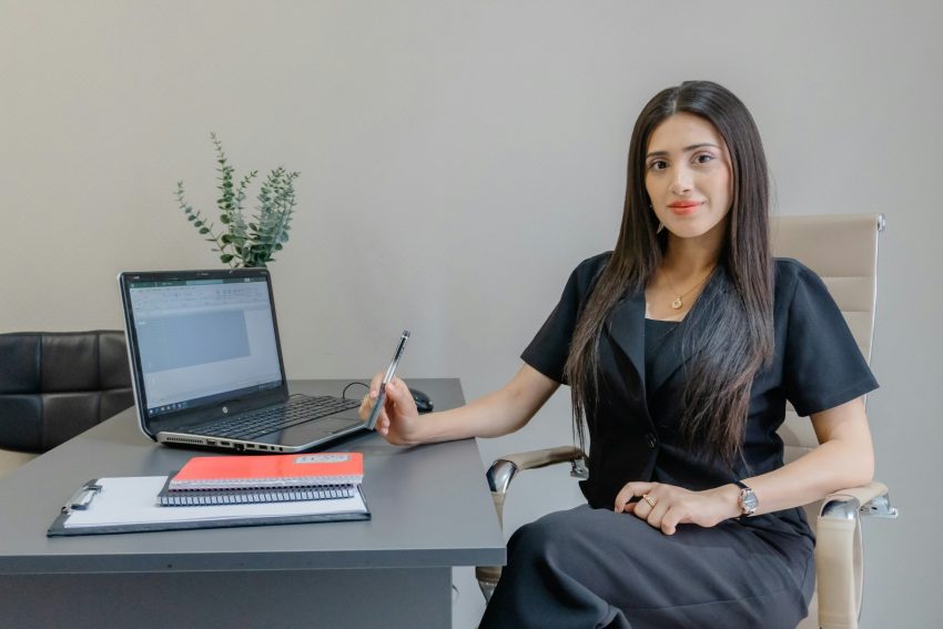 Professional woman updating her resume for a career change after 40